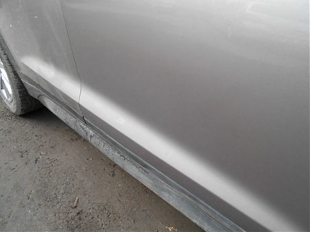 Дверь Hyundai Tucson после локальной покраски
